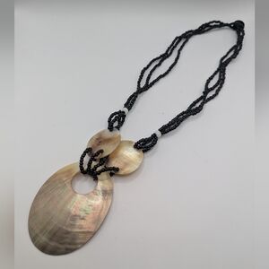 Elegant Black and Gold Shell Pendant Necklace